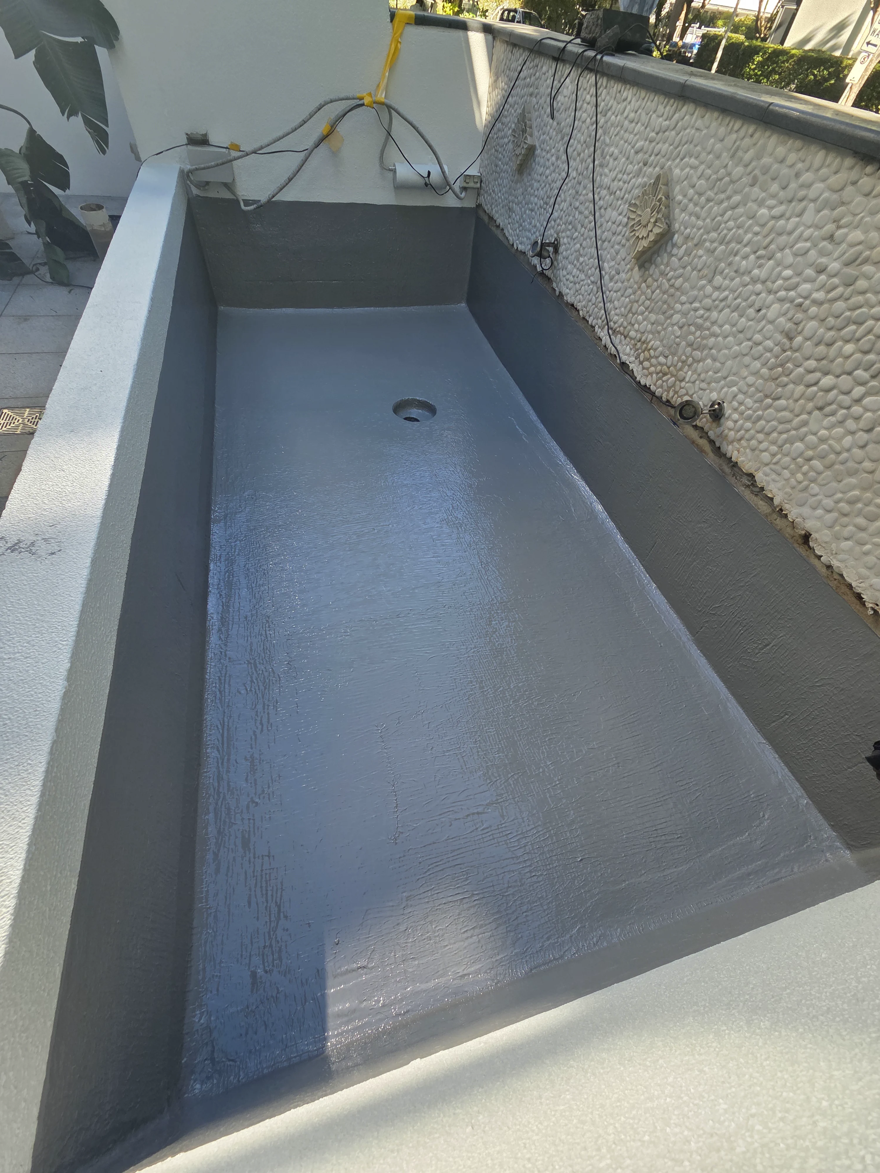 Planter box waterproofing – Before